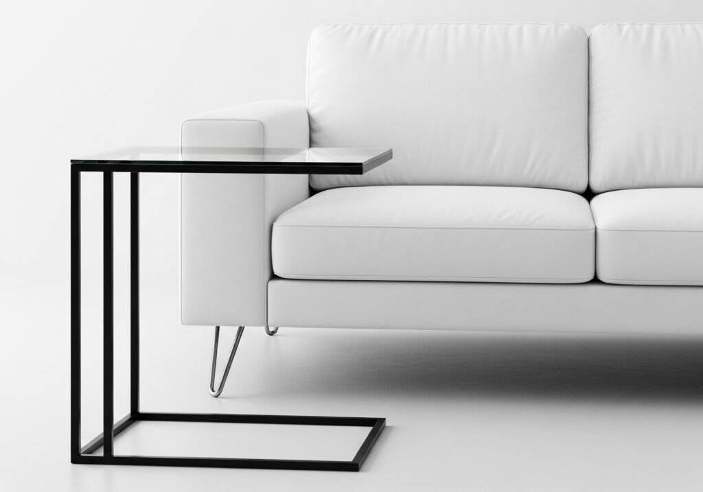 clean lines minimalist furniture detail showing geometric sofa and glass side table design