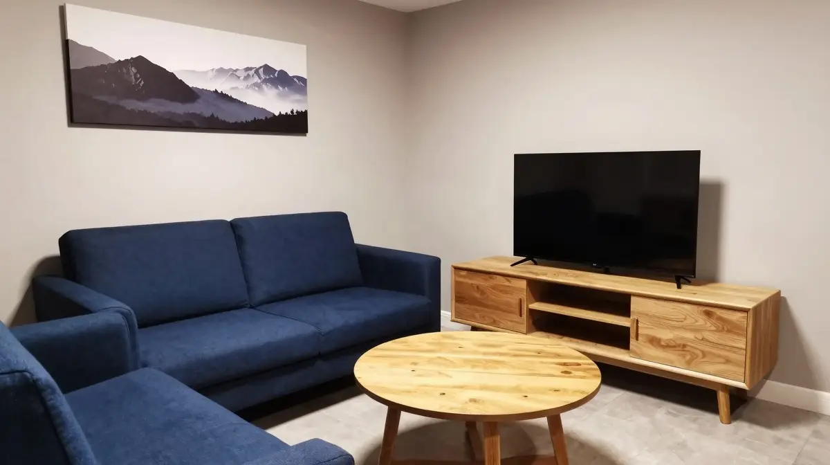 compact living room layout with loveseat and oak tv console